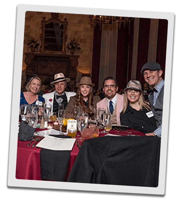 New Orleans Murder Mystery party guests at the table