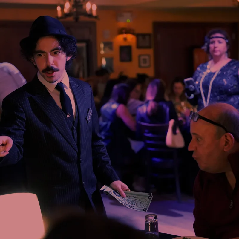A detective questioning a guest at a New Orleans show