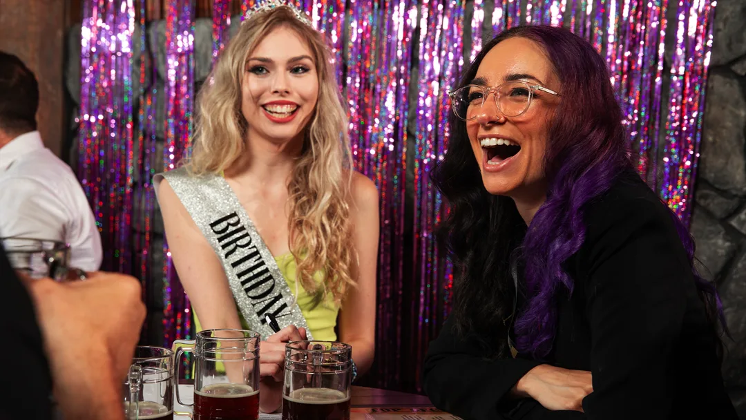 Guests celebrating at a New Orleans murder mystery party