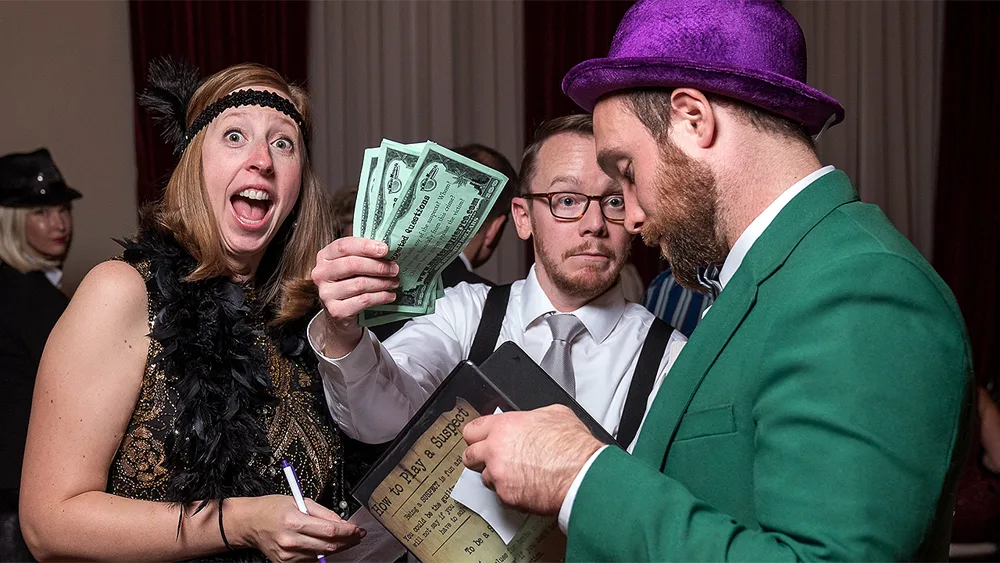 Guests enjoying a New Orleans murder mystery party